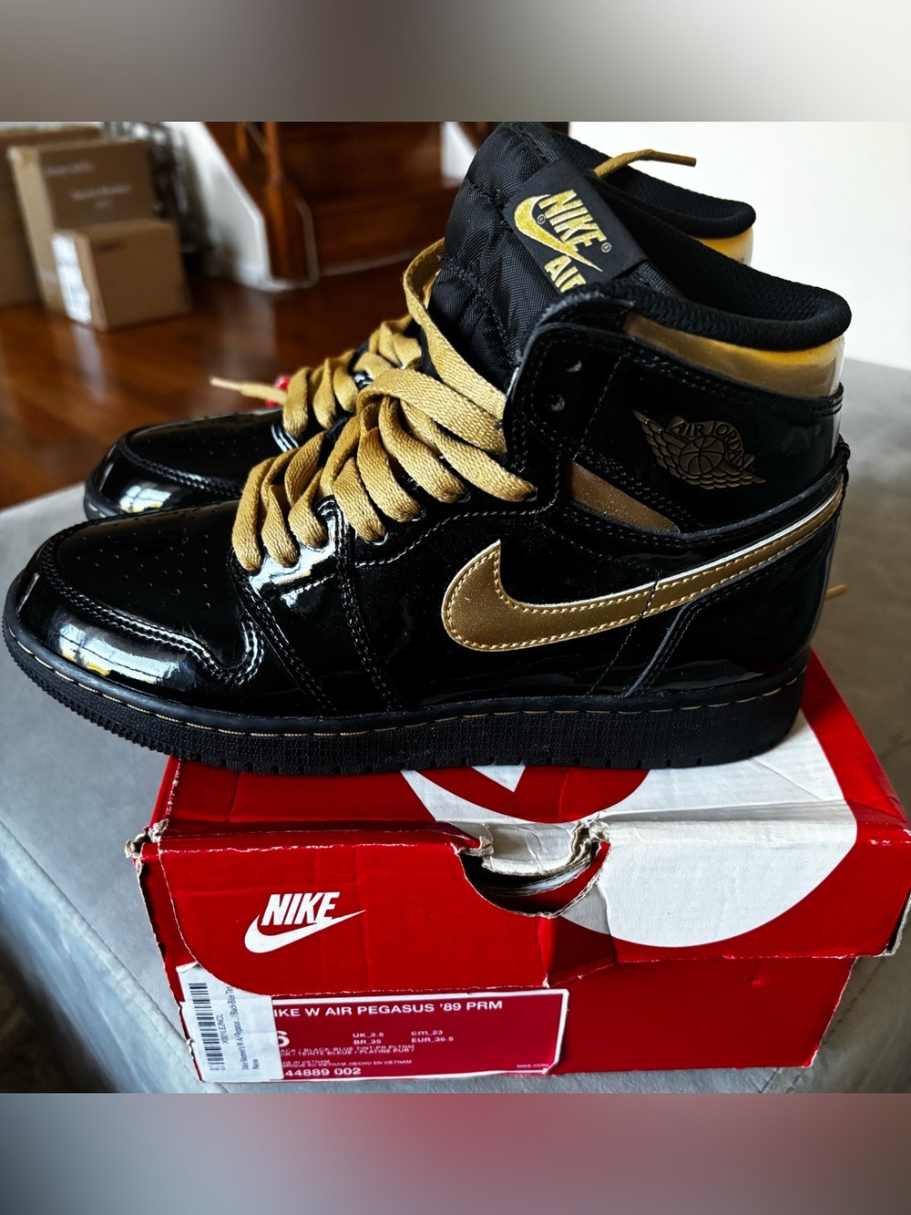 Nike Black and Gold High-Top Sneakers